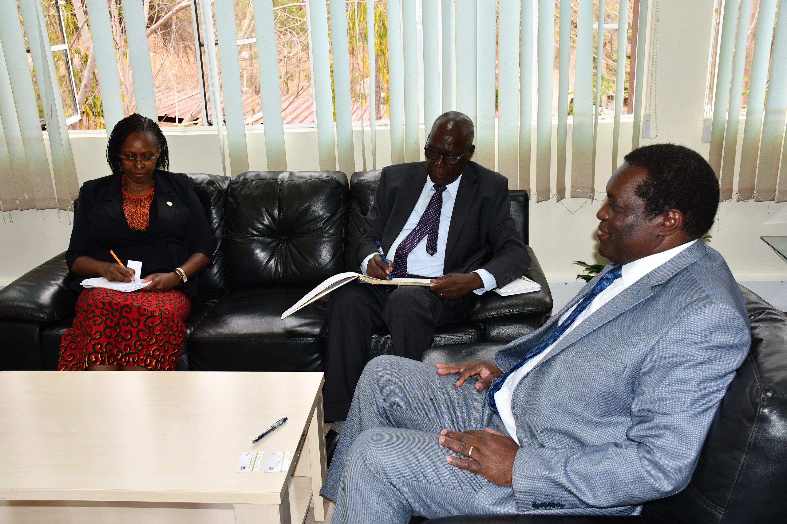 EBK Chairman signing the visitors book at the Vice Chancellors Office